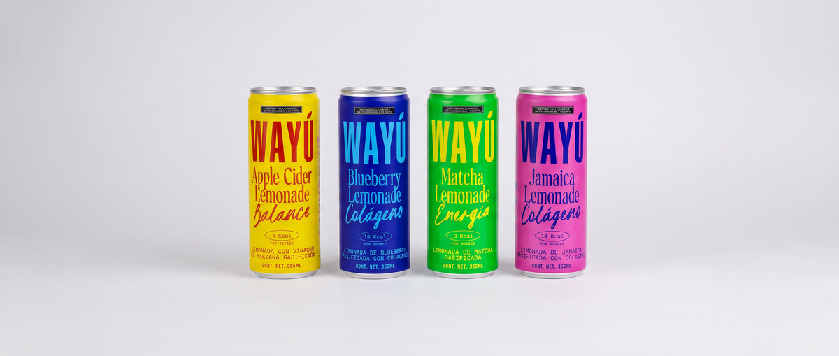Cuatro latas Wayú en fila: Apple Cider, Blueberry, Matcha y Jamaica Lemonade, arma tu kit de limonadas funcionales